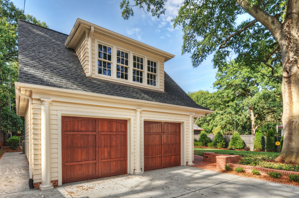Photo of a mid-sized traditional detached two-car garage in Charlotte.