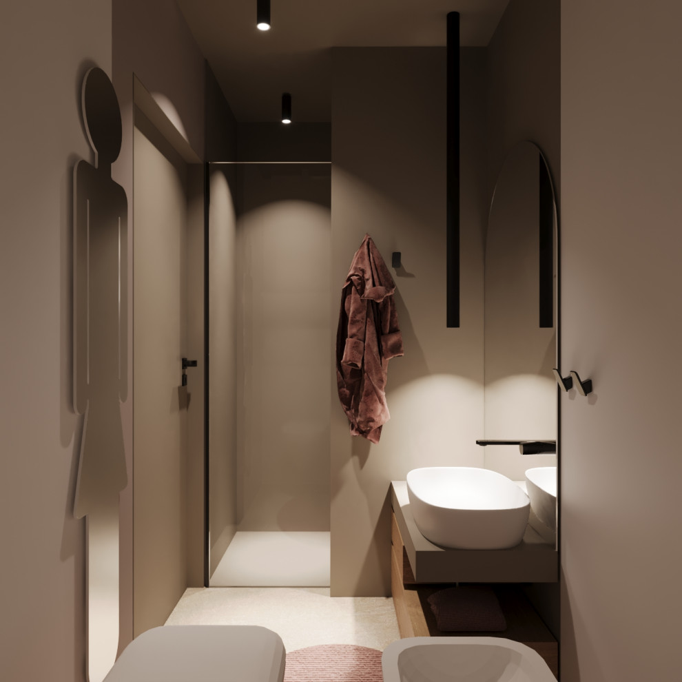 This is an example of a mid-sized modern 3/4 bathroom in Bologna with flat-panel cabinets, light wood cabinets, a curbless shower, a two-piece toilet, gray tile, porcelain tile, beige walls, porcelain floors, a vessel sink, solid surface benchtops, beige floor, a hinged shower door, grey benchtops, a niche, a single vanity, a floating vanity, recessed and panelled walls.