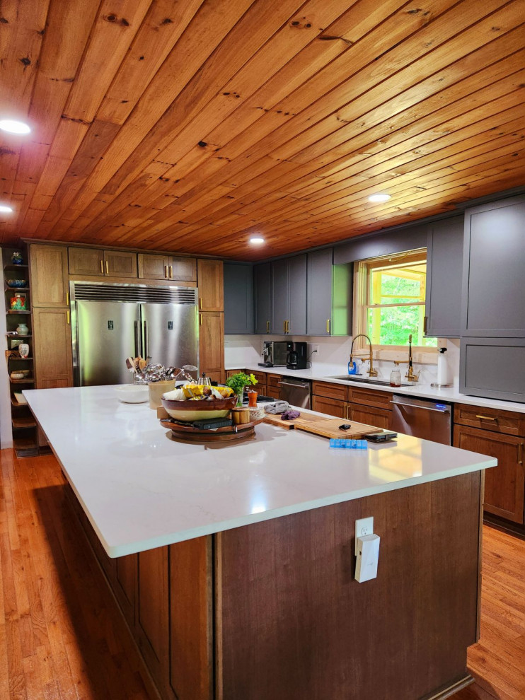 Chef's Kitchen with Wood Ceiling and Quartz Island