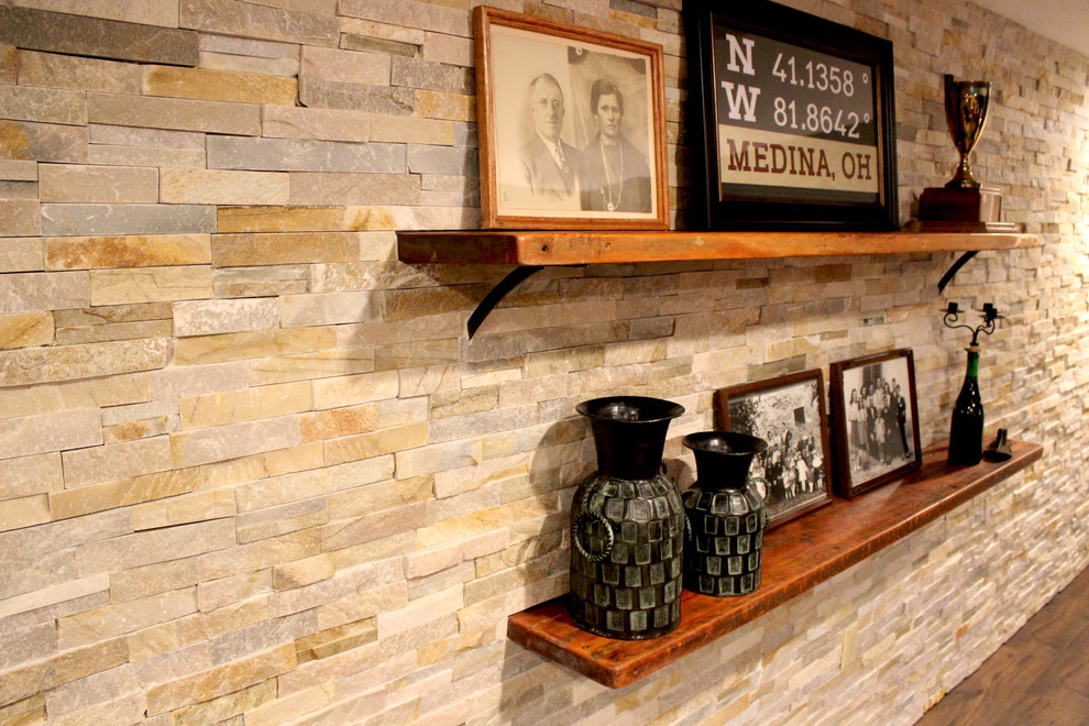Inspiration for a large rustic underground medium tone wood floor and brown floor basement remodel in Cleveland with beige walls and no fireplace
