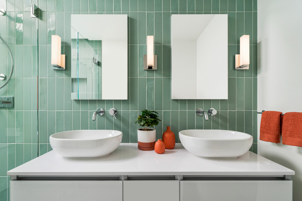 Example of a mid-sized trendy kids' green tile and porcelain tile porcelain tile, gray floor and double-sink bathroom design in San Francisco with flat-panel cabinets, white cabinets, a wall-mount toilet, white walls, a vessel sink, quartz countertops, a hinged shower door, white countertops and a floating vanity