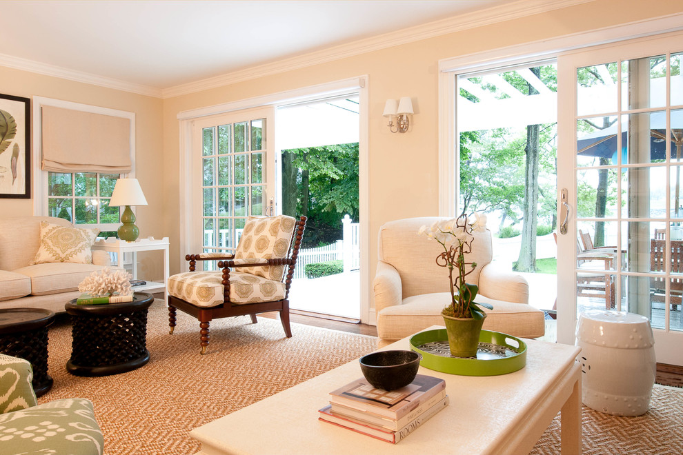 Inspiration for a large traditional living room in New York with beige walls.
