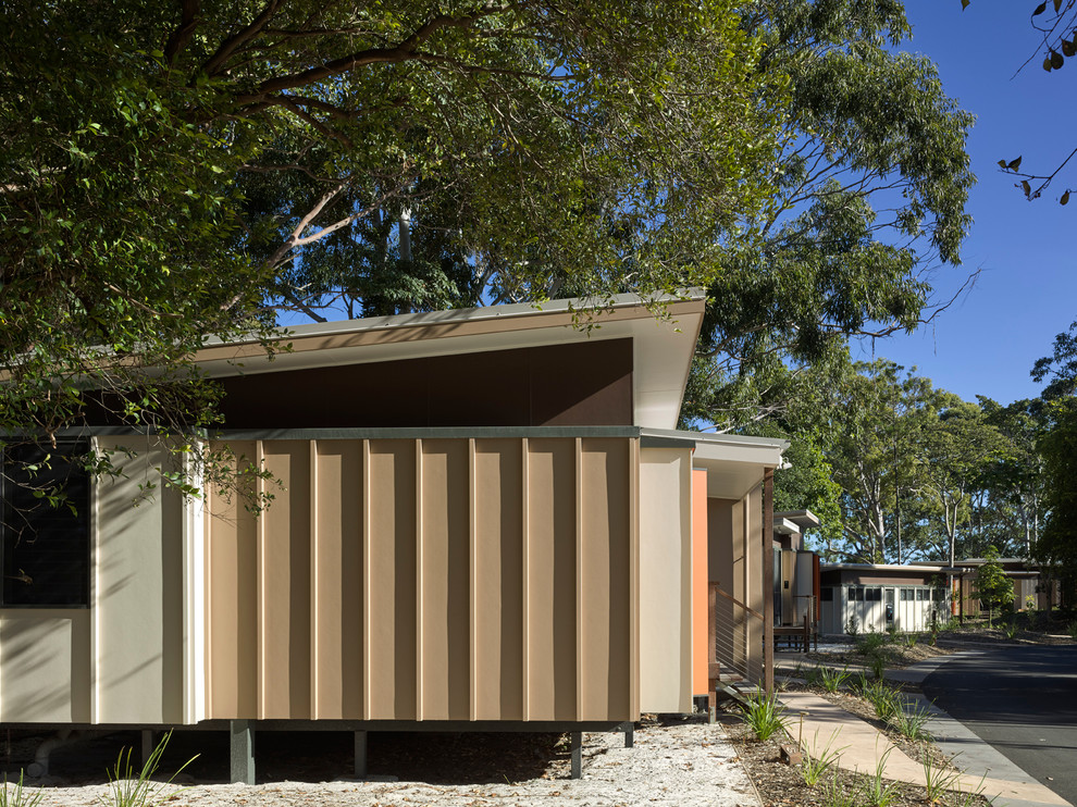 Design ideas for a beach style home design in Brisbane.