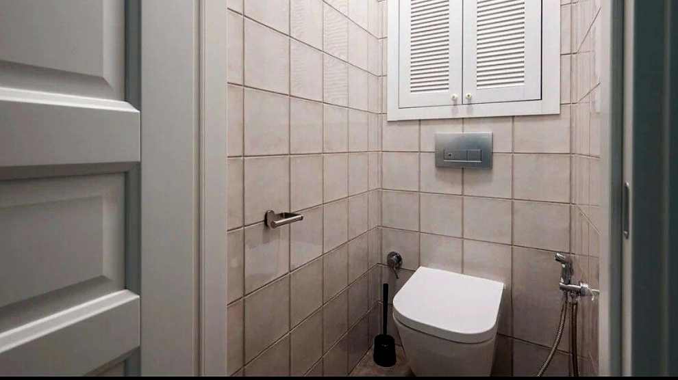Photo of a contemporary powder room in Moscow with a wall-mount toilet, ceramic tile and porcelain floors.