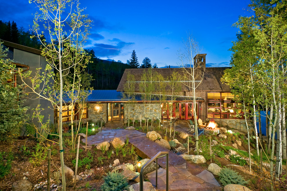 Huge mountain style entryway photo in Denver