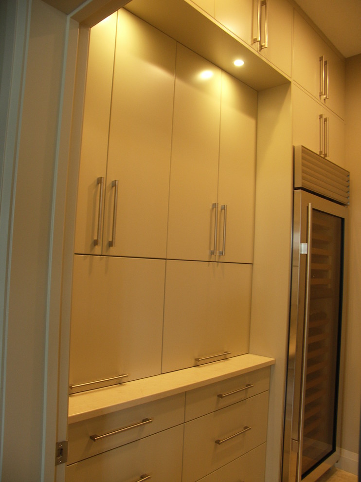 Inspiration for a modern kitchen in Edmonton with stainless steel cabinets.