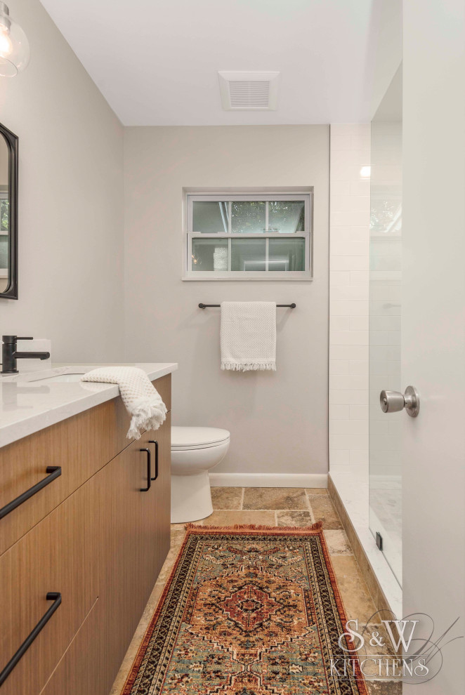 Inspiration for a small modern master bathroom in Tampa with flat-panel cabinets, medium wood cabinets, an open shower, a two-piece toilet, white tile, cement tile, grey walls, travertine floors, an undermount sink, quartzite benchtops, beige floor, an open shower and white benchtops.
