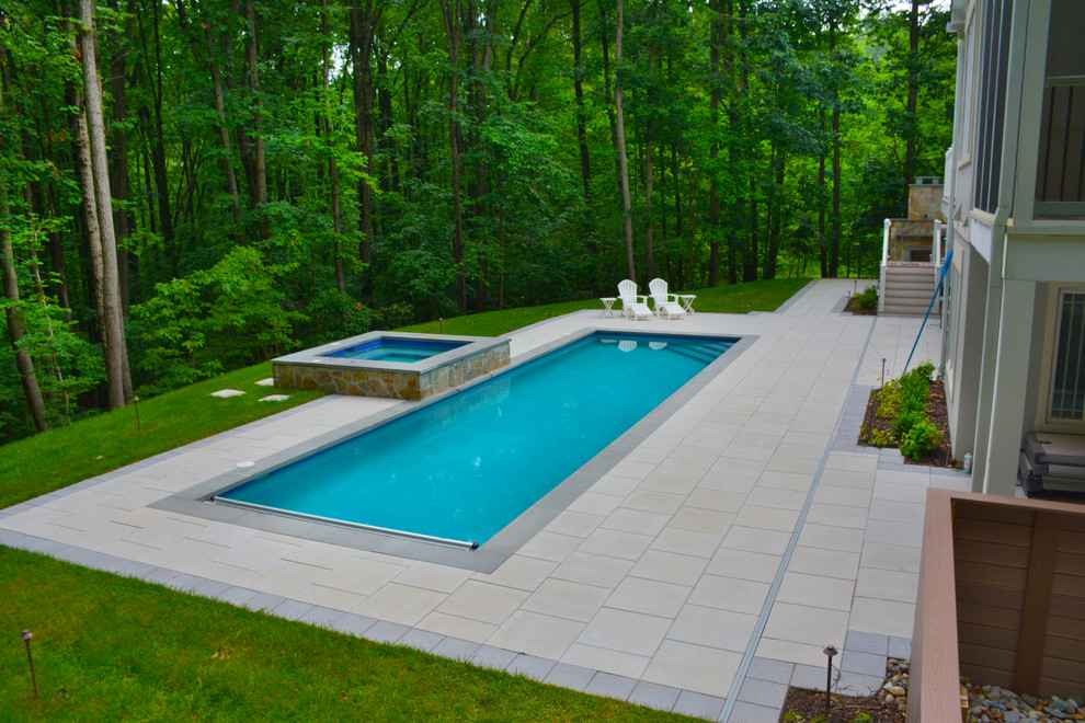 Modern pool in Baltimore with concrete pavers.