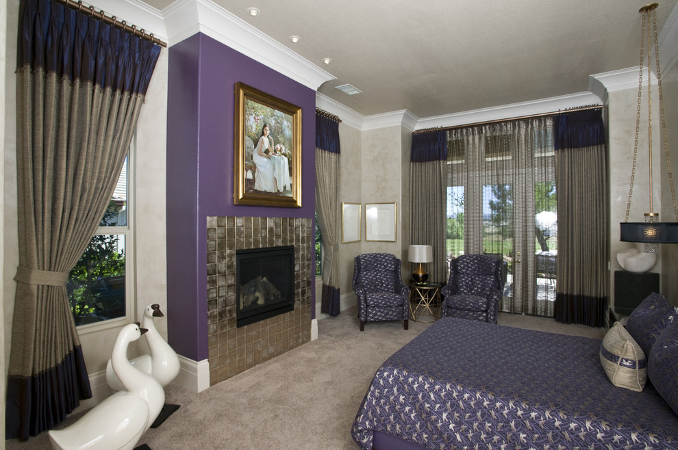 Inspiration for a large contemporary master bedroom in Sacramento with a tile fireplace surround, beige walls, carpet, a standard fireplace and beige floor.