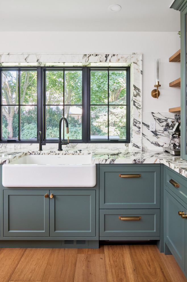 Example of a transitional kitchen design in Toronto