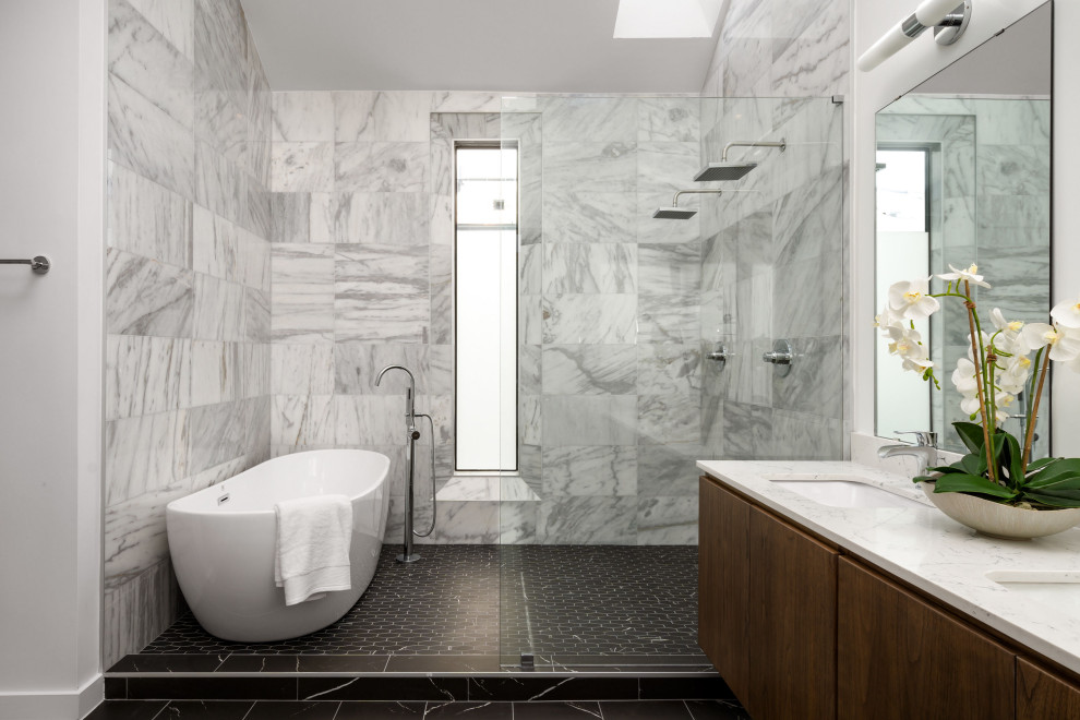 Inspiration for a contemporary gray tile black floor and double-sink bathroom remodel in Austin with flat-panel cabinets, dark wood cabinets, white walls, an undermount sink, white countertops and a floating vanity
