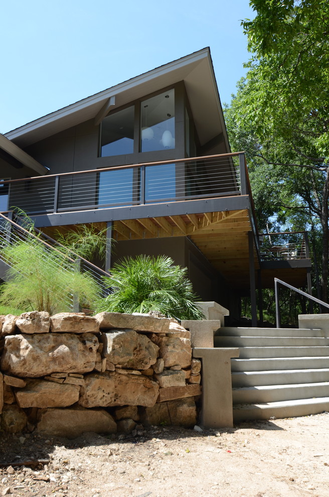 Photo of a contemporary two-storey grey exterior in Austin.