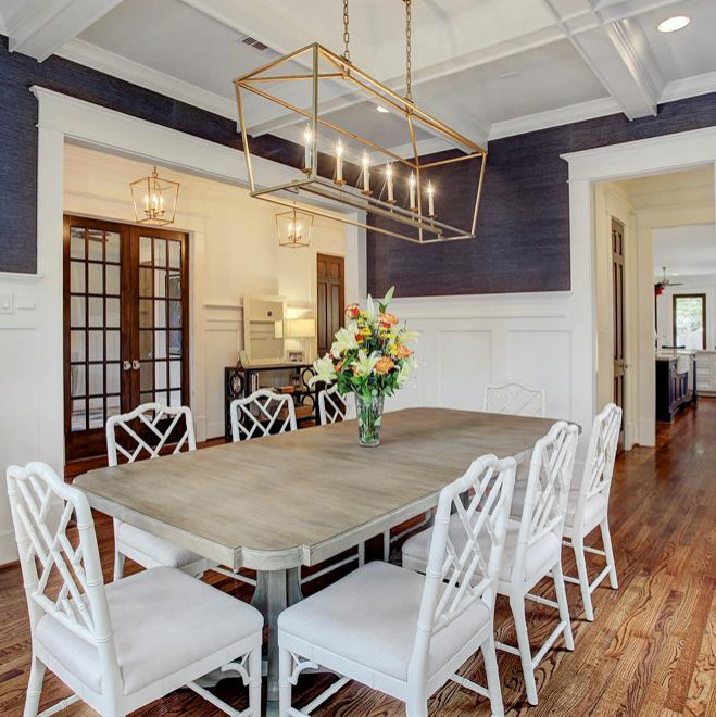 Mid-sized transitional medium tone wood floor, brown floor, coffered ceiling and wallpaper enclosed dining room photo in Houston with blue walls