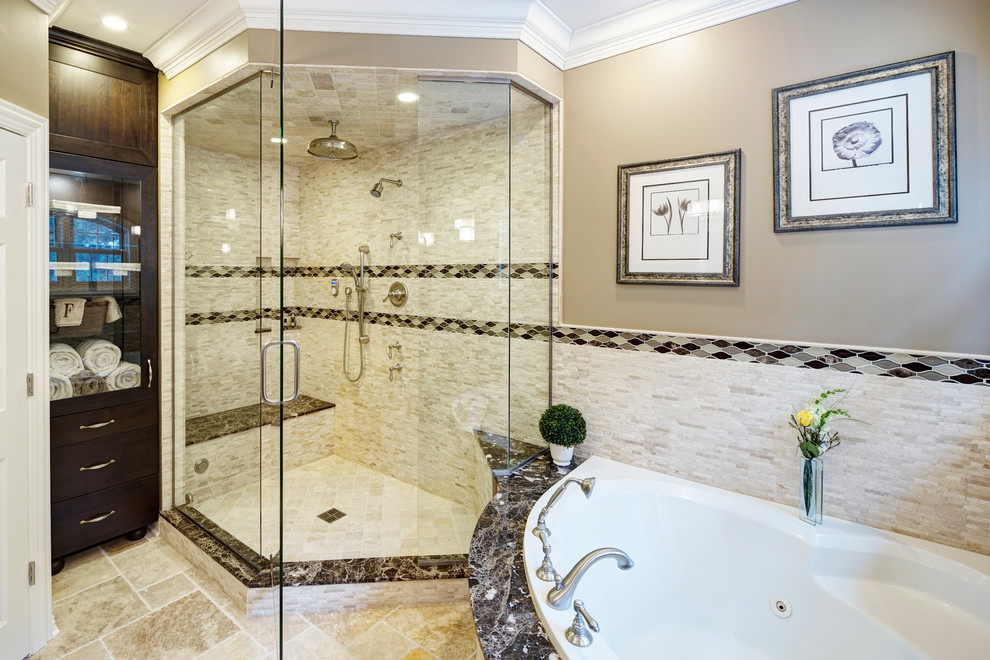 Drop-in bathtub - large transitional master beige tile travertine floor drop-in bathtub idea in Chicago with an undermount sink, furniture-like cabinets, dark wood cabinets, marble countertops, a two-piece toilet and beige walls