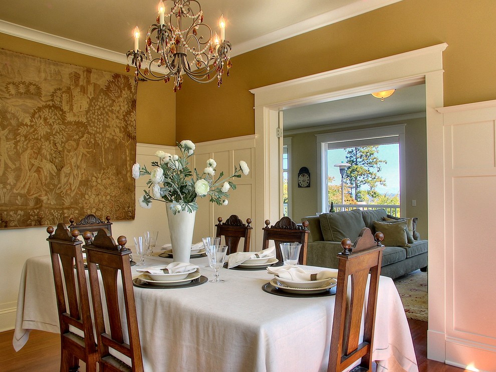 Design ideas for a traditional separate dining room in Seattle with medium hardwood floors.