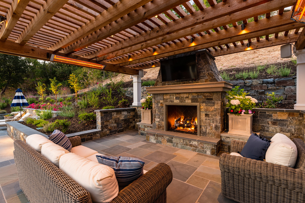 Pergola Pavilion with an Outdoor Kitchen and Living Room Transitional