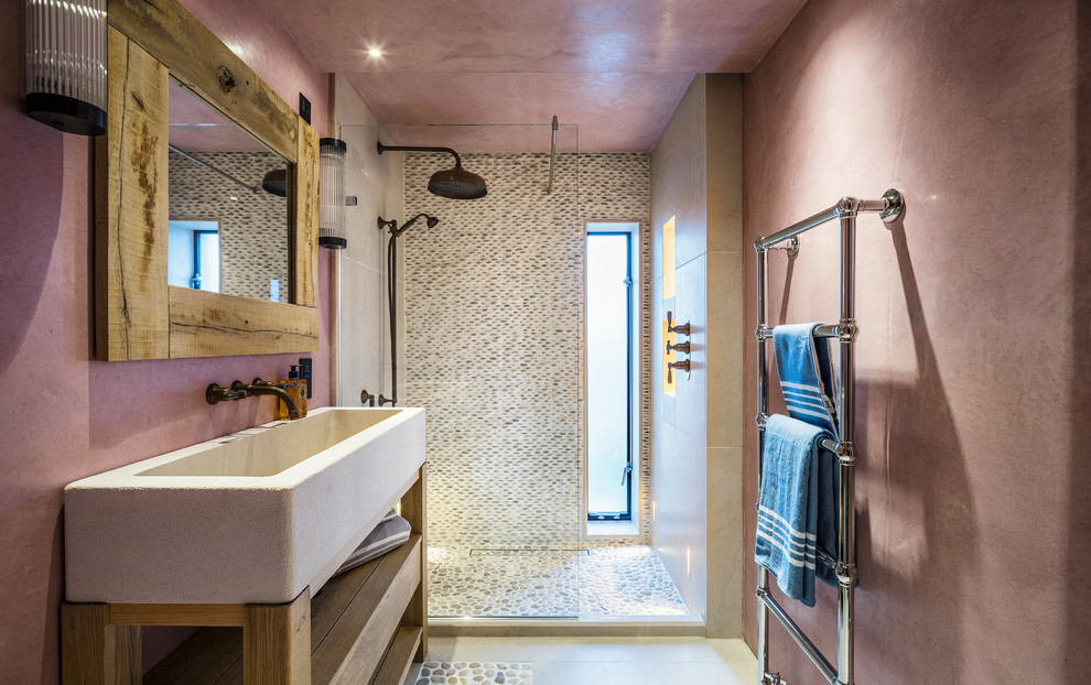 Beach style 3/4 bathroom in Cheshire with open cabinets, light wood cabinets, an alcove shower, multi-coloured tile, mosaic tile, pink walls, pebble tile floors and an open shower.