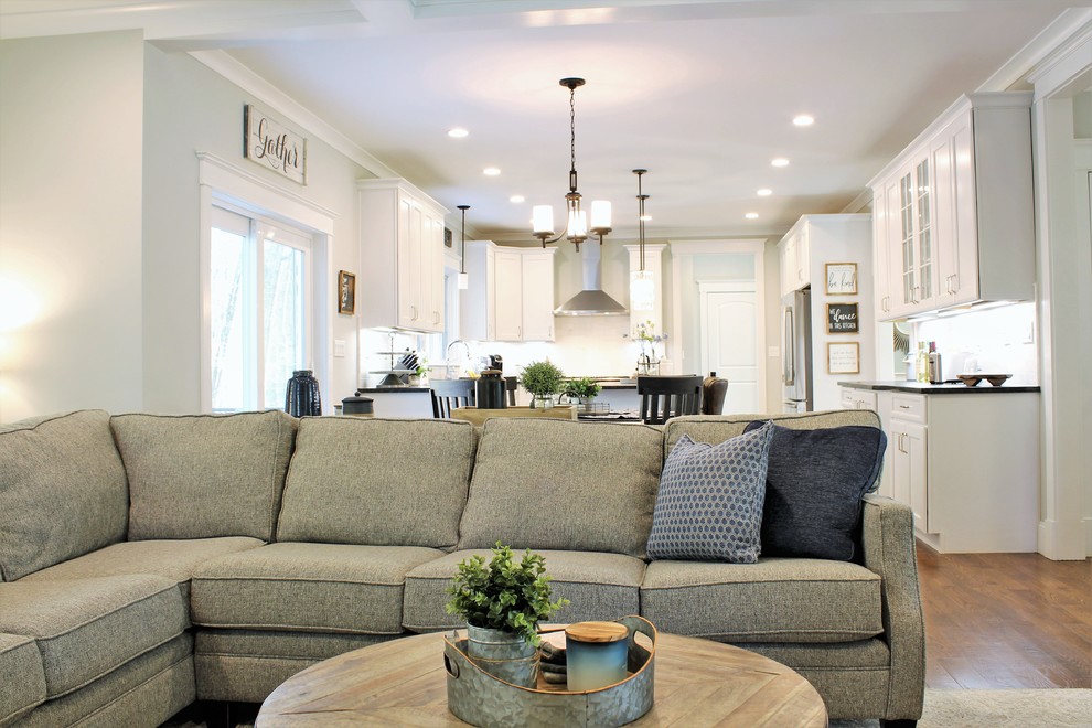 Living room - large transitional open concept dark wood floor and gray floor living room idea in Boston with gray walls, a standard fireplace, a brick fireplace and a wall-mounted tv