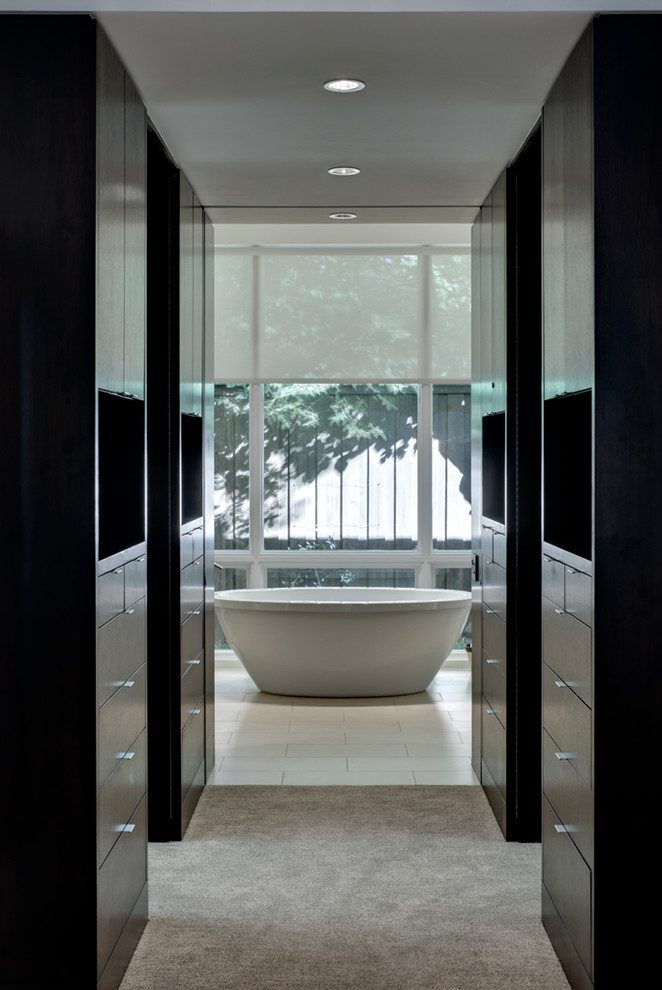 Inspiration for a contemporary bathroom in Dallas with a freestanding tub.