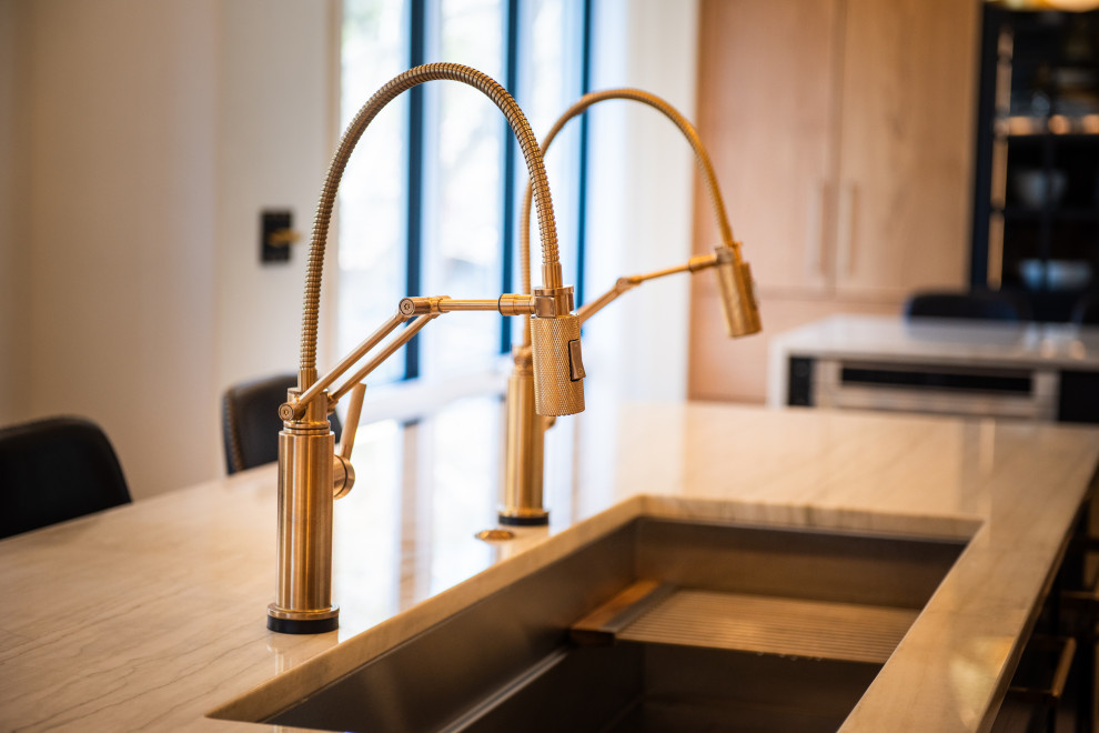 Example of a transitional kitchen design in Denver