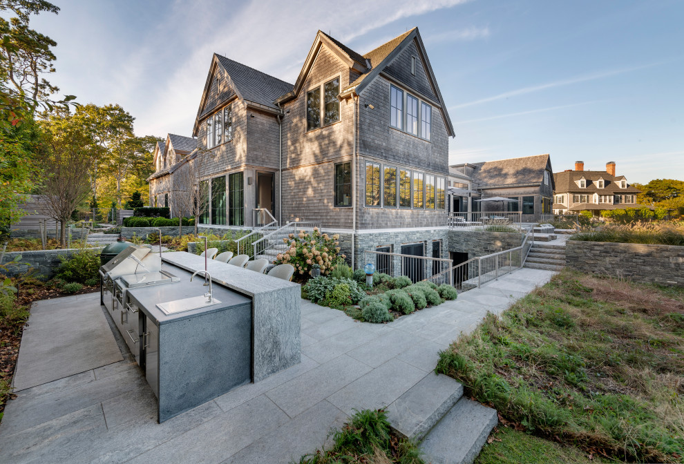 Inspiration for a transitional pool remodel in Boston with a bbq area