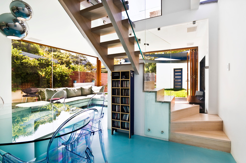 Photo of a mid-sized contemporary staircase in Sydney.