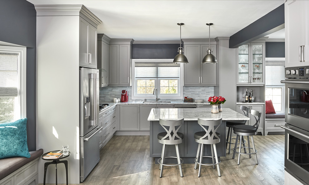 Example of a transitional kitchen design in Toronto