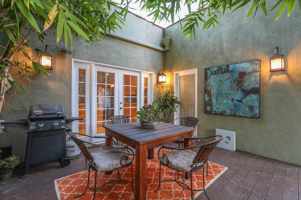 Tuscan patio photo in Los Angeles with decking and a bbq area