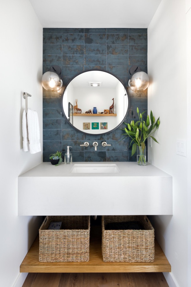 Inspiration for a contemporary powder room remodel in Denver