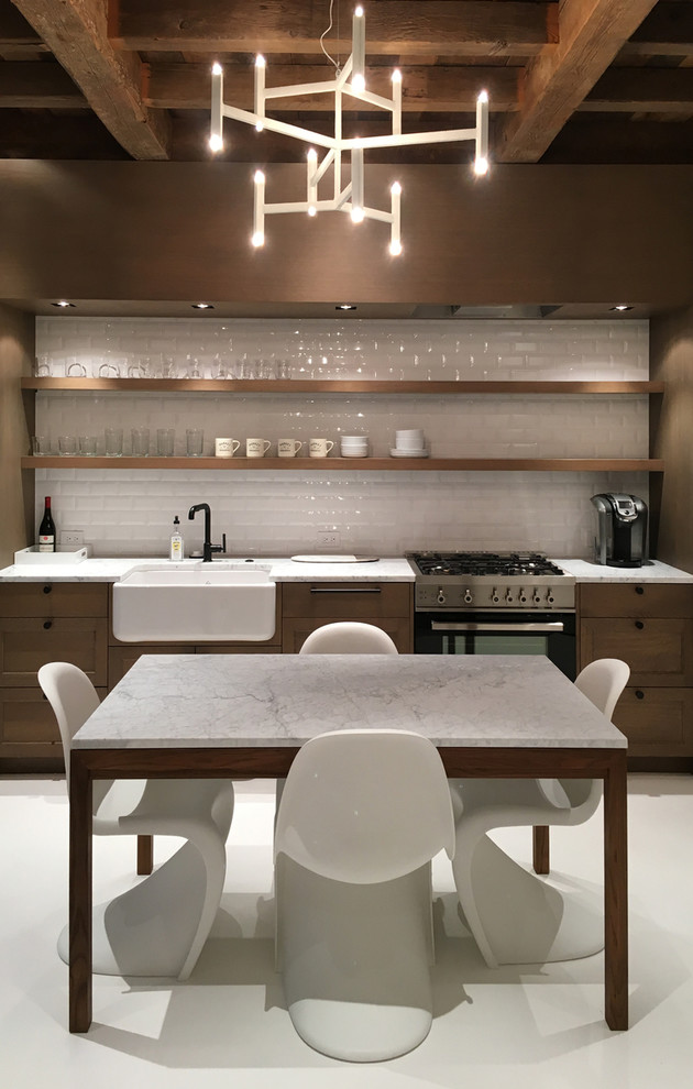 Kitchen - small transitional kitchen idea in Denver