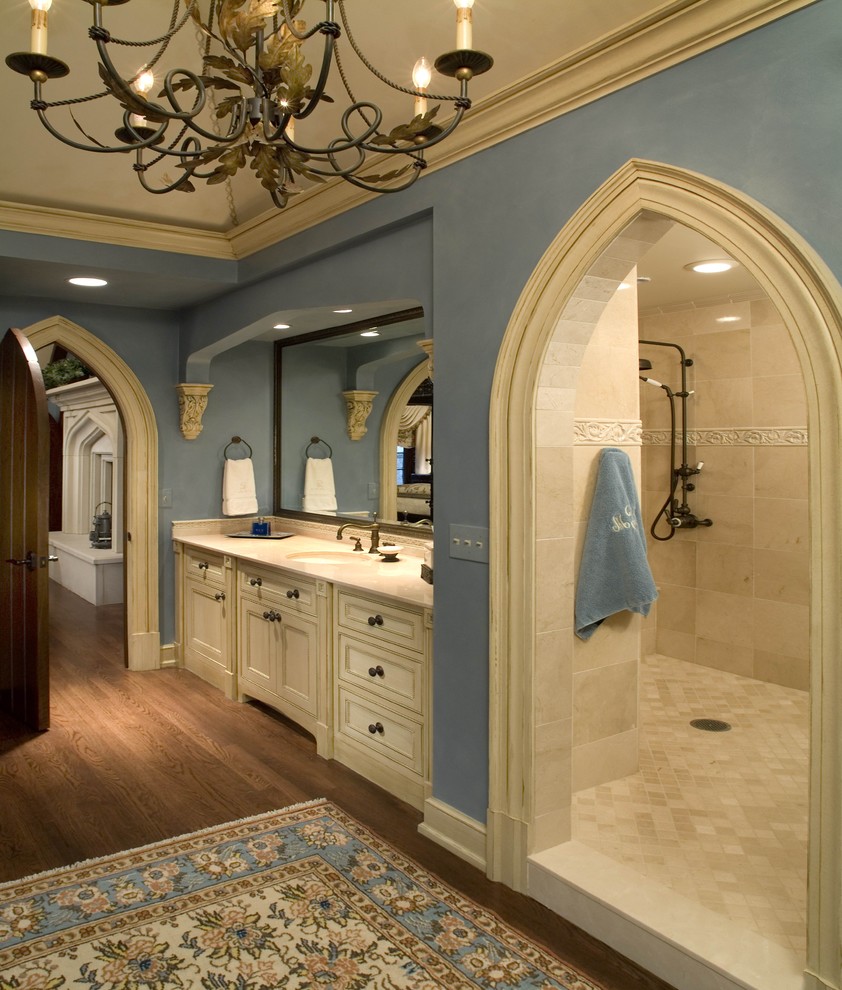 Traditional bathroom in Columbus with an undermount sink, recessed-panel cabinets, beige cabinets, an open shower, beige tile and an open shower.