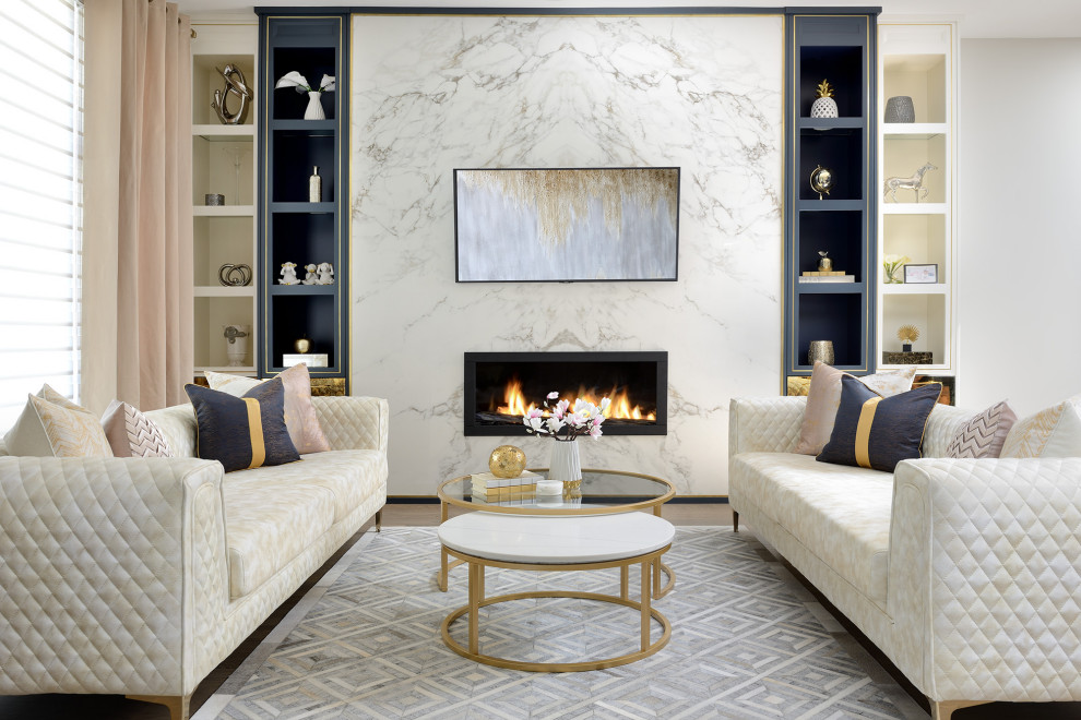 Réalisation d'un salon design ouvert avec un mur gris, un sol en contreplaqué, une cheminée ribbon, un manteau de cheminée en pierre et un sol beige.