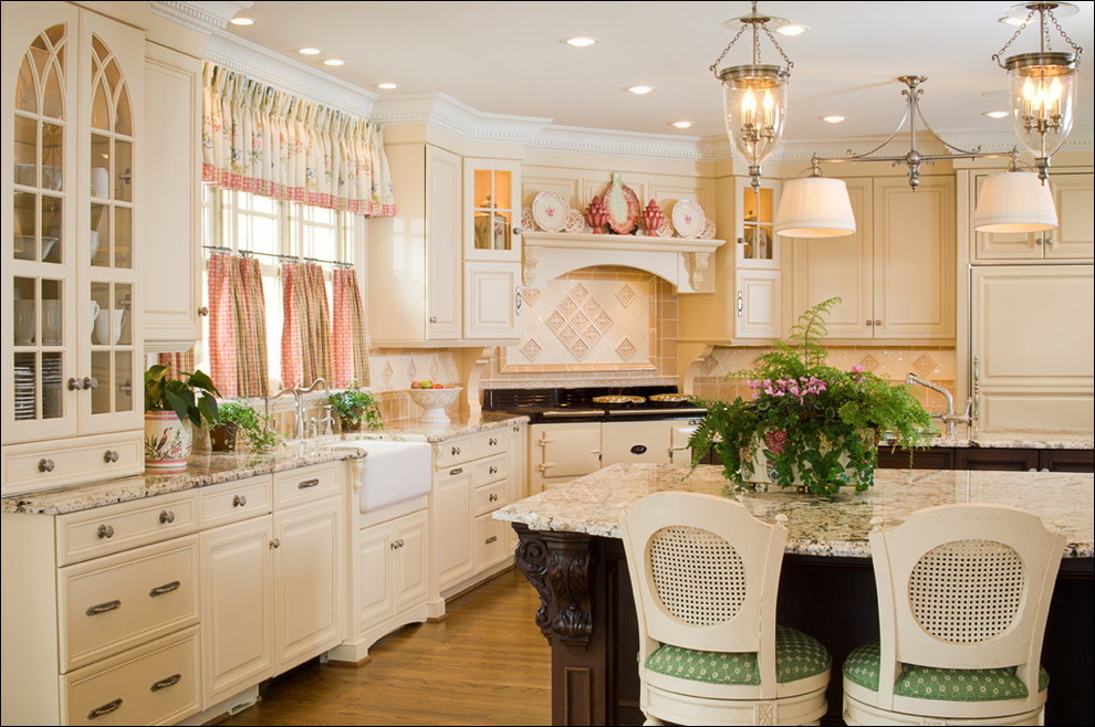Traditional kitchen in Charlotte with a farmhouse sink and granite benchtops.