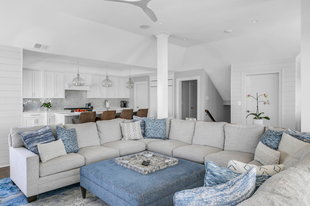 This is an example of a large coastal living room in Tampa.