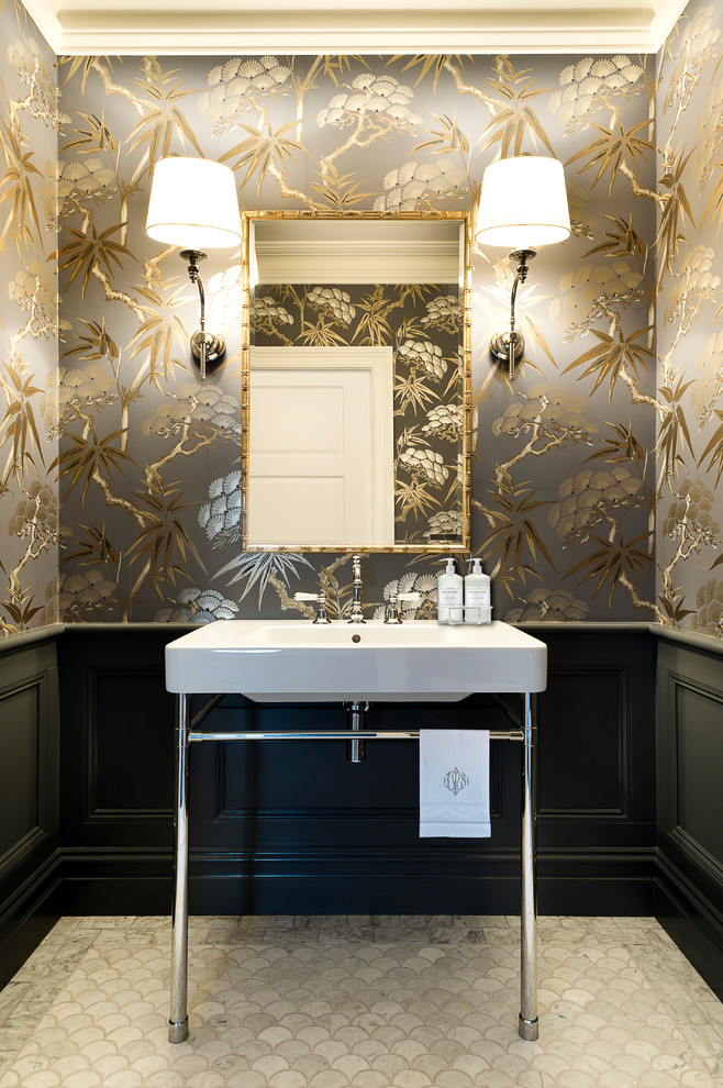 This is an example of a small traditional powder room in Sydney with a console sink, multi-coloured walls and mosaic tile floors.