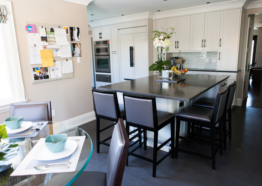 Example of a transitional kitchen design in Toronto