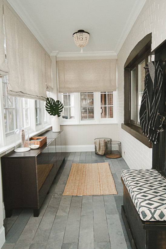 Inspiration for a small transitional vestibule in Toronto with ceramic floors and grey floor.