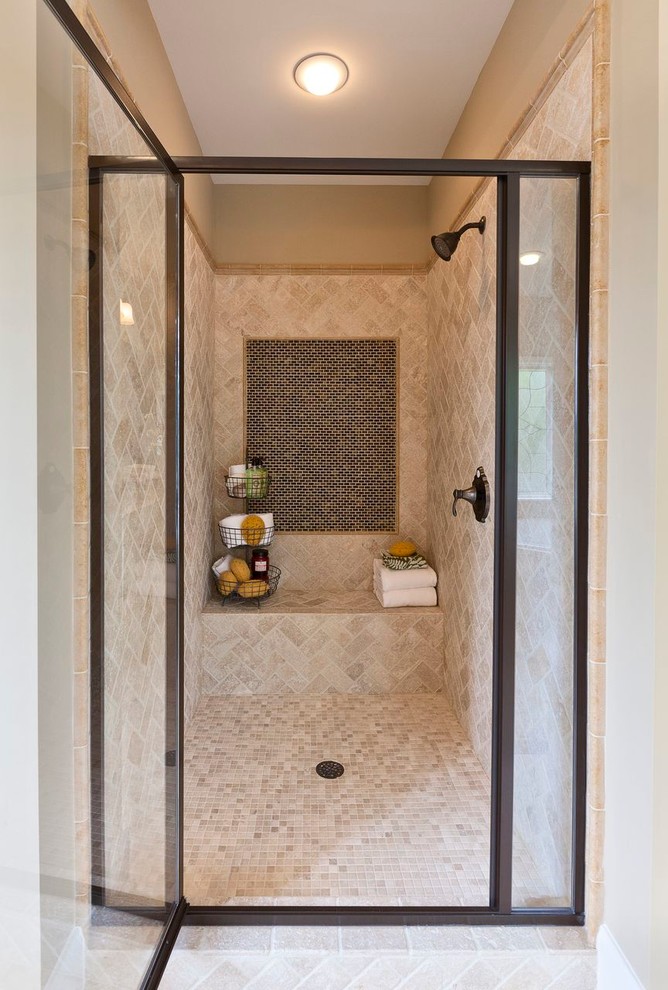 Design ideas for a traditional bathroom in Atlanta with an alcove shower and beige tile.