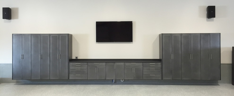 Garage workshop - large transitional attached garage workshop idea in Kansas City