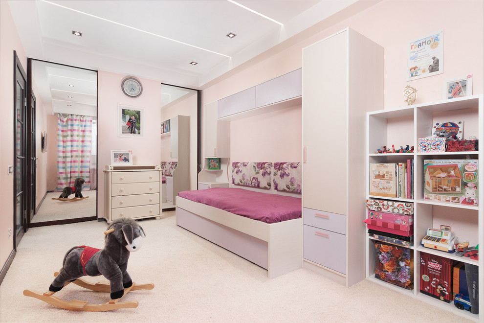 Inspiration for a mid-sized contemporary kids' playroom for kids 4-10 years old and girls in Saint Petersburg with pink walls, carpet and pink floor.