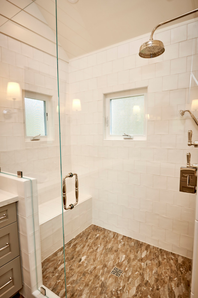Bathroom - mid-sized master white tile and cement tile porcelain tile, brown floor, double-sink, exposed beam and shiplap wall bathroom idea in San Diego with recessed-panel cabinets, green cabinets, a wall-mount toilet, white walls, an undermount sink, quartz countertops, a hinged shower door, white countertops and a built-in vanity