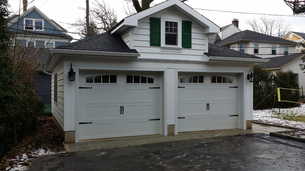 Photo of a mid-sized traditional detached garage in New York.