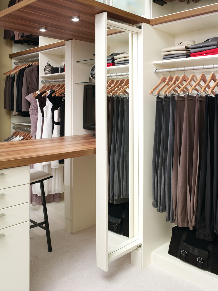 Design ideas for a small traditional gender-neutral walk-in wardrobe in New York with open cabinets.