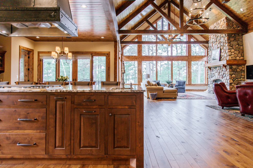 Mountain style home design photo in Denver