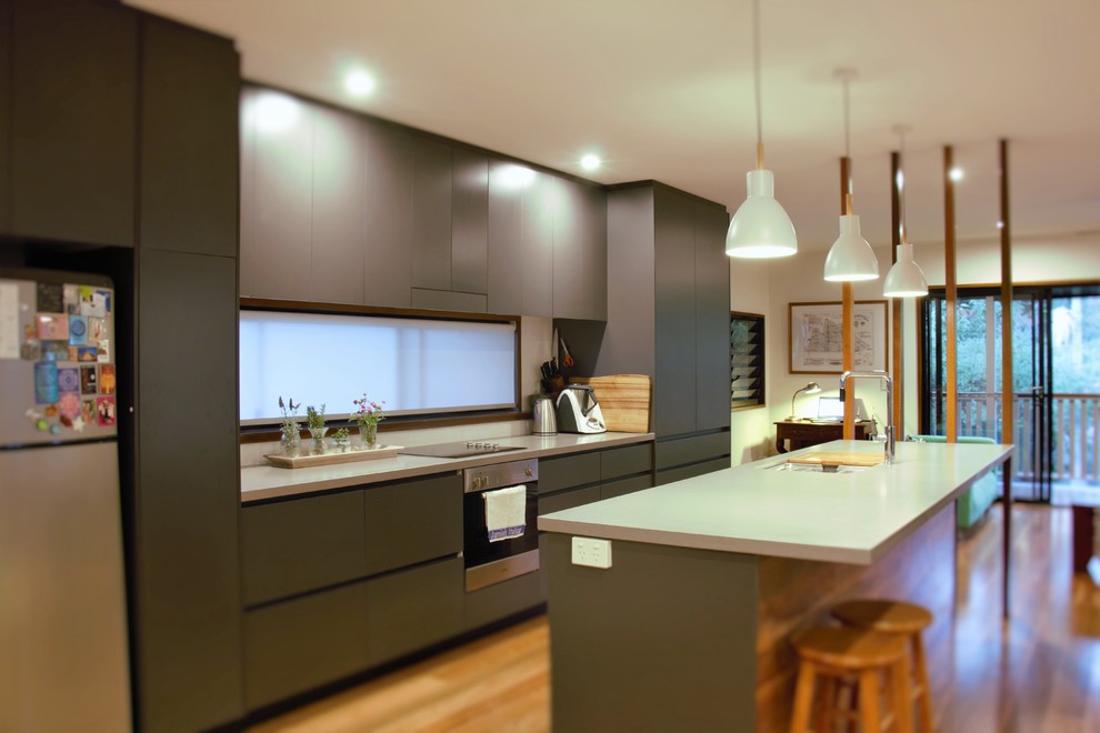 This is an example of a tropical kitchen in Brisbane.