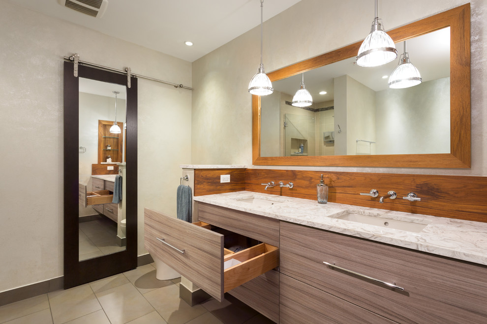 Mid-sized transitional master bathroom in Chicago with flat-panel cabinets, medium wood cabinets, an alcove tub, an alcove shower, a two-piece toilet, white tile, ceramic tile, white walls, ceramic floors, an undermount sink and marble benchtops.