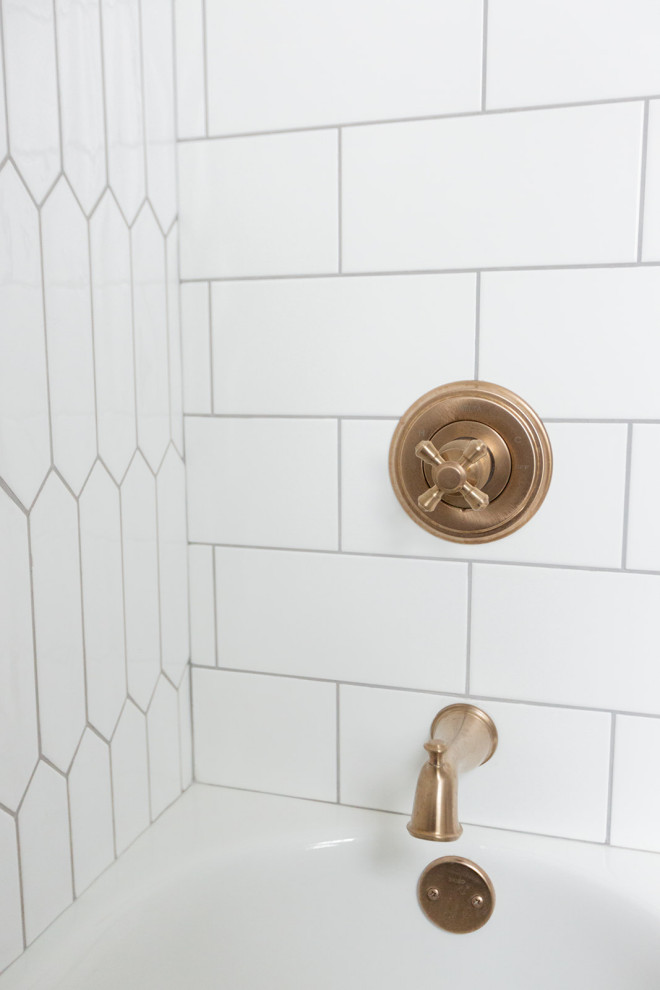Inspiration for a mid-sized transitional white tile and porcelain tile porcelain tile and white floor alcove bathtub remodel with a console sink