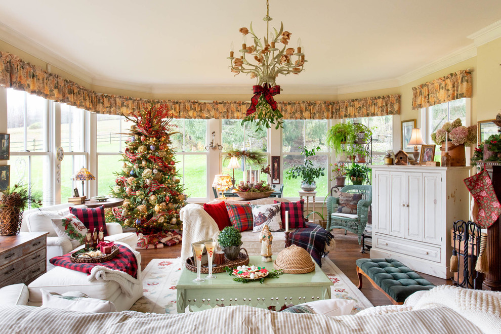 Farmhouse dark wood floor and brown floor living room photo in Other with beige walls
