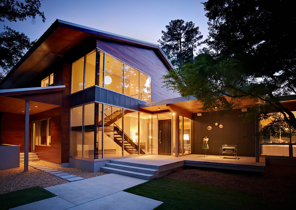 Design ideas for a modern exterior in Charlotte with wood siding.