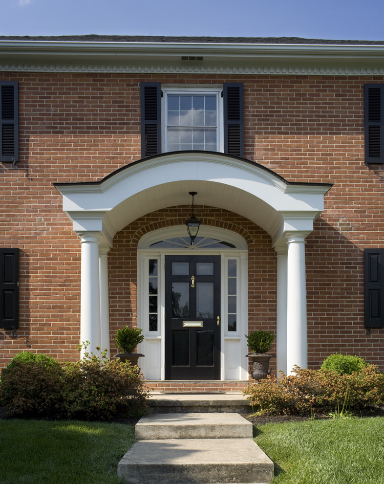 Inspiration for a traditional front door in Philadelphia with a single front door and a black front door.